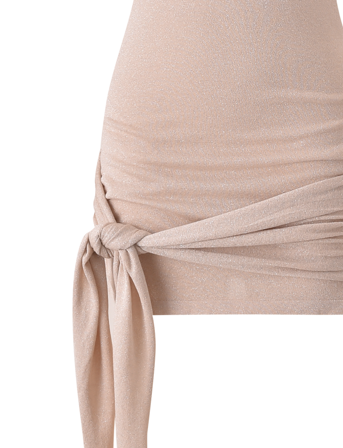 Close-up of the SOTERA KNIT MINI DRESS in gold by TIGERMIST, a sparkly bodycon style with soft, stretchy fabric, shimmery finish, and side knot detail draping at the hip.