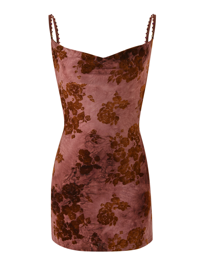 The SPARROW MINI DRESS - CHOCOLATE BURNOUT by TIGERMIST is a sleeveless, fitted velvet mini dress with spaghetti straps, a sweetheart neckline, and a mauve and chocolate floral burnout pattern.