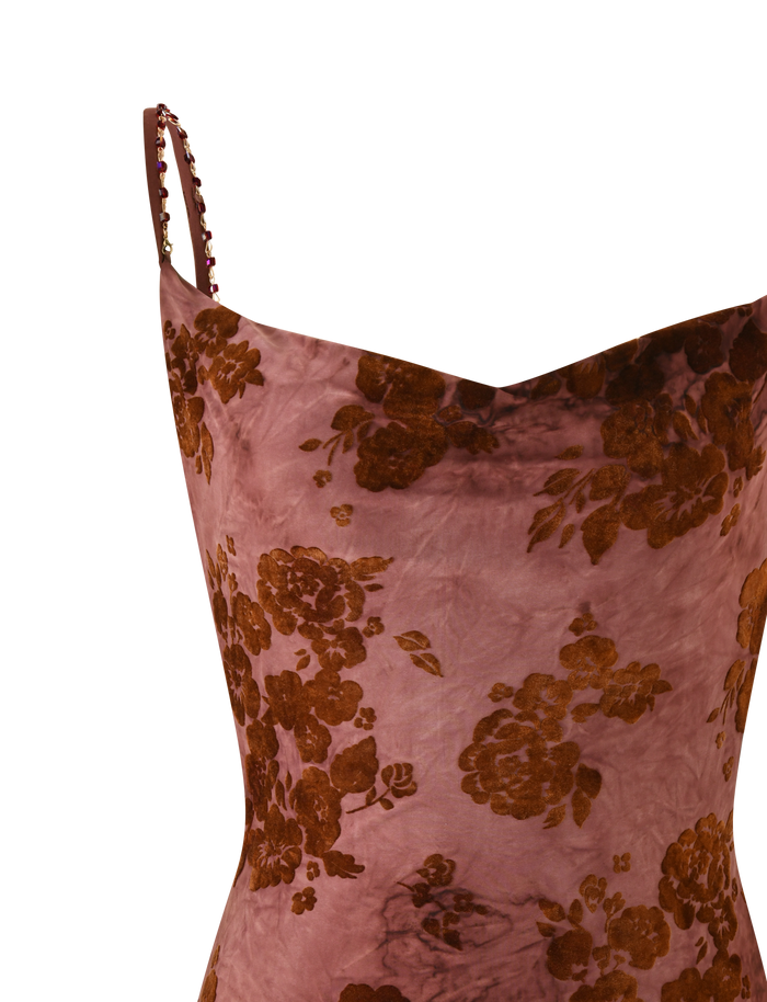 The TIGERMIST SPARROW MINI DRESS in chocolate burnout features pink velvet with floral patterns and a delicate beaded one-shoulder strap, shown close-up against a plain white background.