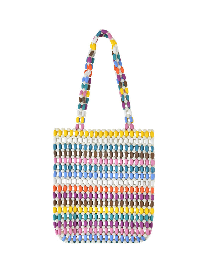 The STORMY BAG - STRIPE by TIGERMIST is a handmade, multicolored wooden bead bag featuring vibrant rainbow hues like yellow, purple, blue, and white in a striped design. It includes two matching beaded handles for added style.