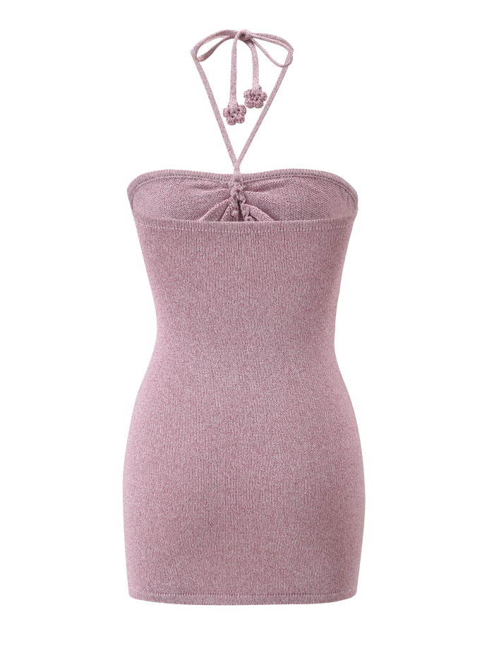 The SUNIA DRESS - BABY PINK by TIGERMIST is a sleeveless, form-fitting knit mini dress featuring a halter neck tie with two small tassels, shown on a plain white background.