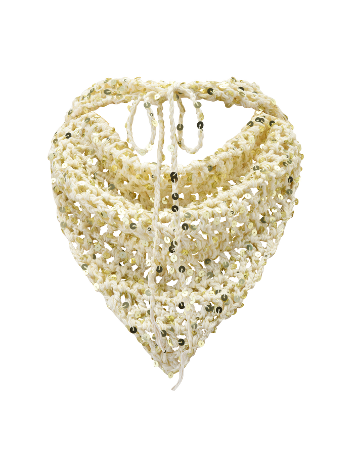 The SYLVAN CROCHET SCARF in cream by TIGERMIST features an open weave with sequins and tie-back strings—an ideal festival accessory for effortless style.