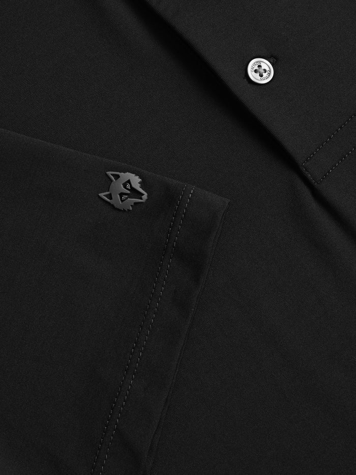 Greyson Tala Polo Black - Wolf Head Logo & Branded Button Detail Close-Up | Greyson Clothiers