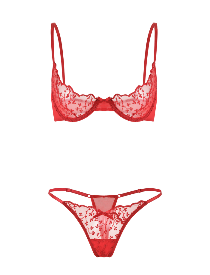 The TIGERMIST TALIYAH SET - RED is a chic 2-piece set with a matching underwire bra (adjustable straps) and thong, both featuring floral lace details. Displayed on a red background, this set radiates elegance.