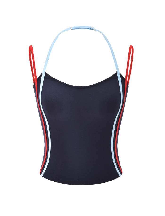 The TATUM TOP - NAVY STRIPE by TIGERMIST is a navy crop singlet with red and light blue straps, an adjustable halter neckline, color-accented sides, and a stylish open back, shown against a plain white background.