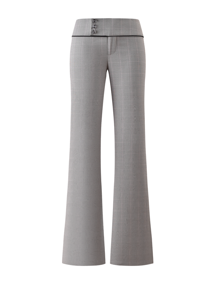 The TERESIA PANT - GREY CHECK by TIGERMIST features light grey, high-waisted suiting trousers with a subtle plaid pattern, wide waistband with three buttons on the left, black trim below the waistband, and flared wide legs.