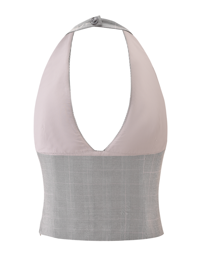 The TERESIA TOP - GREY CHECK by TIGERMIST is a sleeveless halter neck top with a plunging neckline, combining a light gray upper section with a grey check lower section. Made in stretch suiting, it features a button closure at the neck.