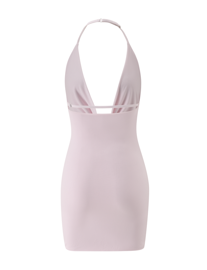 The THARA MINI DRESS - BABY PINK by TIGERMIST is a baby pink halter neck mini dress with a bodycon fit and deep V-neck, accented by a thin strap below the bust, shown on a white background.