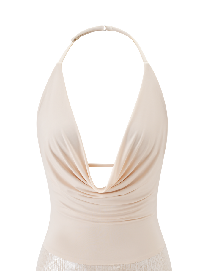 The TIGERMIST THARA MINI DRESS in cream features a sleeveless halter neck with an adjustable tie, plunging draped neckline, and gathered front, showcased against a plain white background.