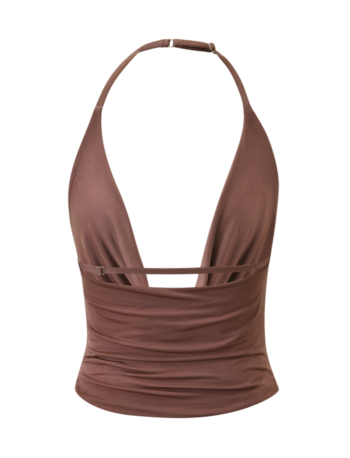 The TIGERMIST THARA TOP - CHOCOLATE is a brown halter-neck top with a deep V-neckline, adjustable chest strap, and ruched fitted design in silky-soft fabric, shown on a plain white background.