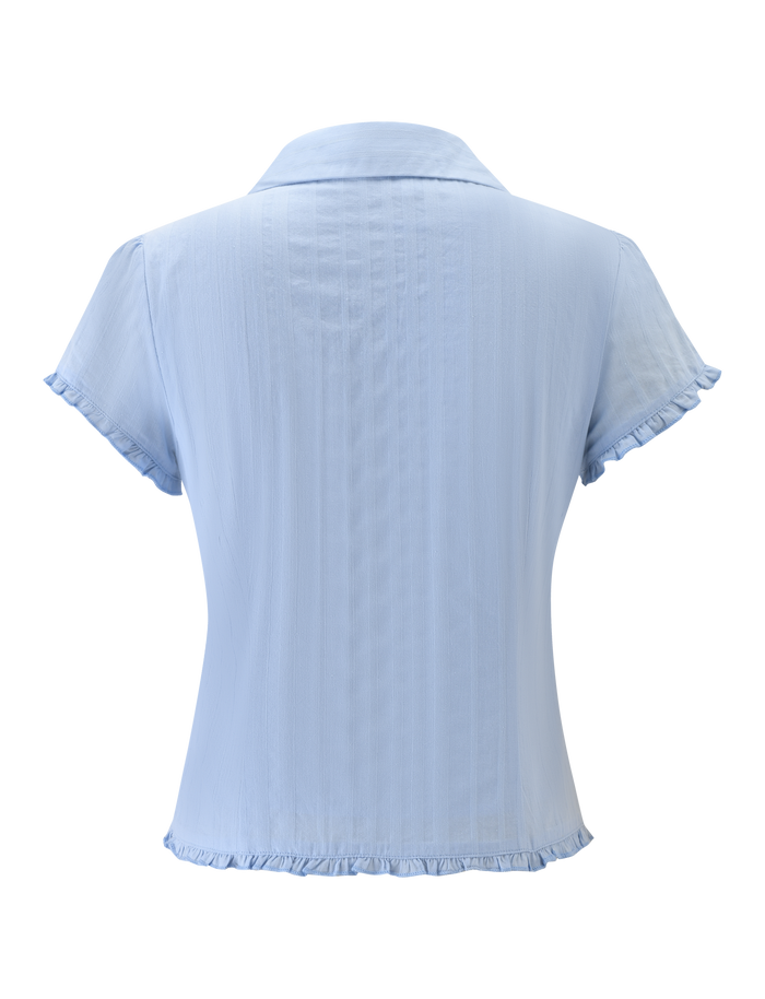The TIGERMIST VALERIE SHORT SLEEVE SHIRT in baby blue is shown from the back, featuring a collar, subtle vertical stripes, and ruffled edges on the sleeves and hem for a delicate look.