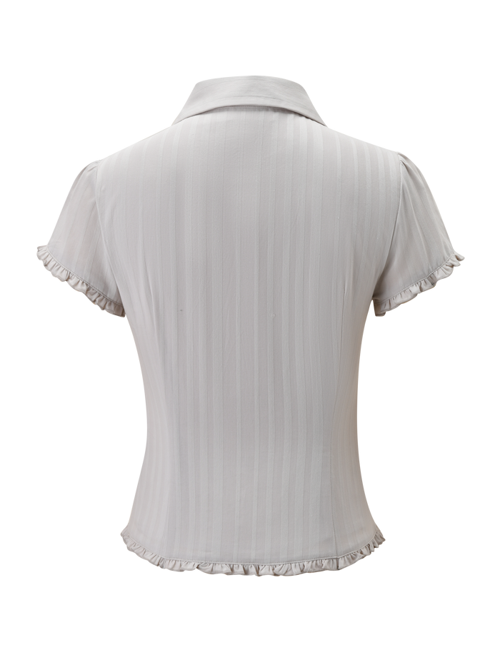 Back view of the TIGERMIST VALERIE SHORT SLEEVE SHIRT - GREY, a light gray cotton shirt with white vertical stripes, collar, and ruffled edges on the sleeves and hem.