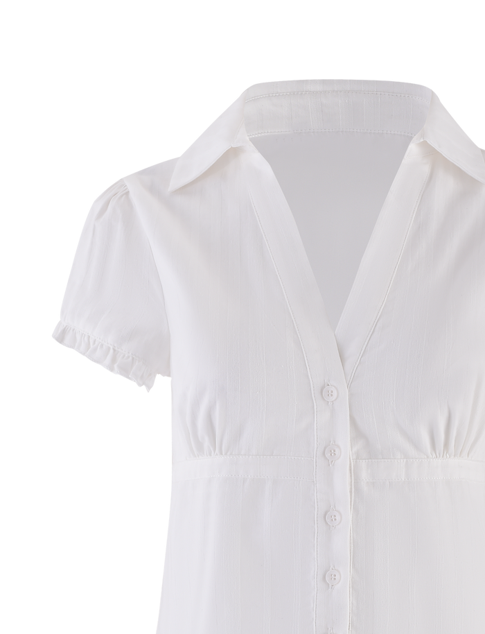 The TIGERMIST VALERIE SHORT SLEEVE SHIRT - WHITE features short puff sleeves, a V-neck with collar, button front, and fitted silhouette. Its subtle texture adds elegance to this versatile, flattering blouse.