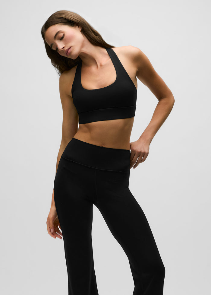 Black Technical Venus Sports Bra Racerback Cutout Detail - Three-Quarter View On Model | Greyson Clothiers