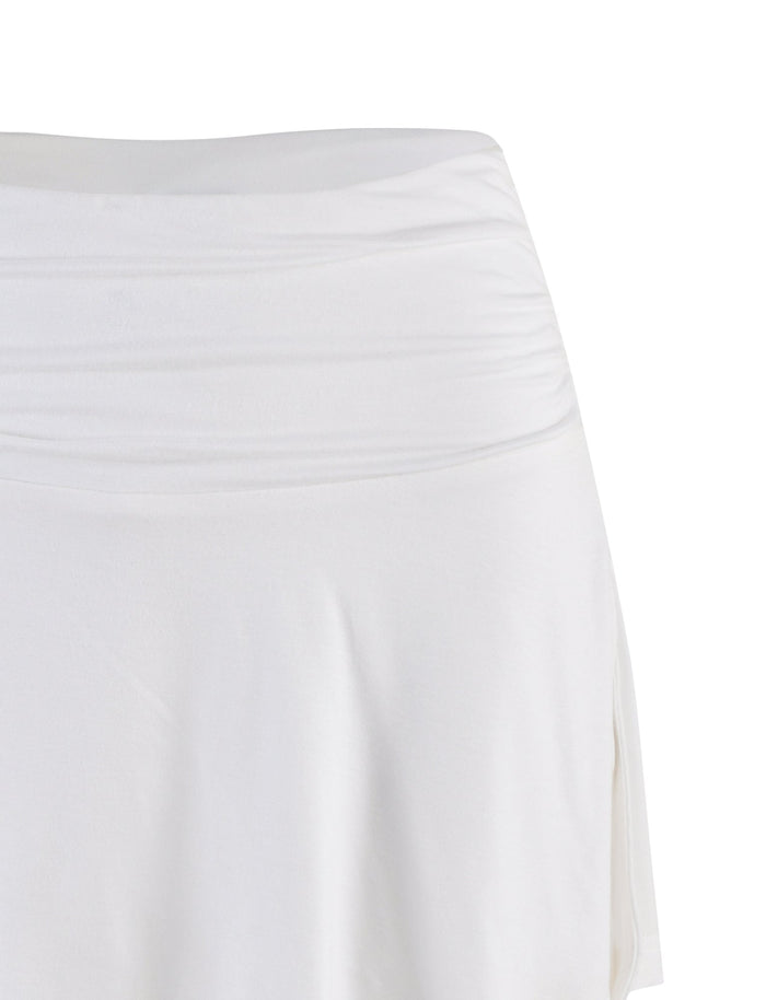 Close-up of the VERITY SKORT in white by TIGERMIST, featuring a high-waisted design, smooth gathered waistband, and soft flowing fabric against a plain white background.
