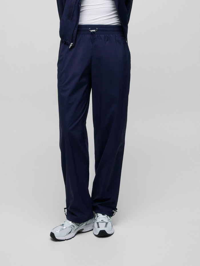 Maltese Blue Wind Jogger Elastic Waistband Detail - Front On Model | Greyson Clothiers
