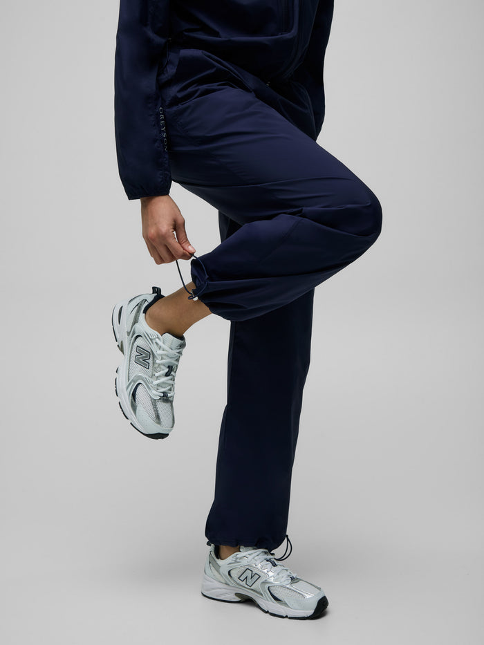 Maltese Blue Women's Wind Jogger Adjustable Ankle Drawcord - Side View On Model | Greyson Clothiers