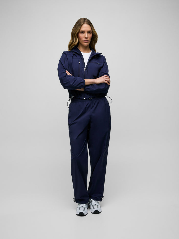 Maltese Blue Women's Wind Jogger Full-Length Styled Look with Matching Jacket - Front View | Greyson Clothiers