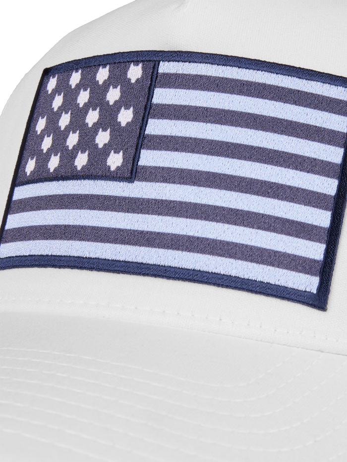 Greyson Clothiers Wolf Flag Patch Close-Up Detail on Arctic White Trucker Hat | Greyson Clothiers