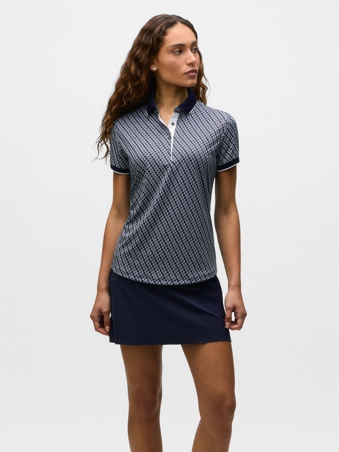 Maltese Blue Wolf Tails Geometric Print Women's Golf Polo - On Model Front View | Greyson Clothiers