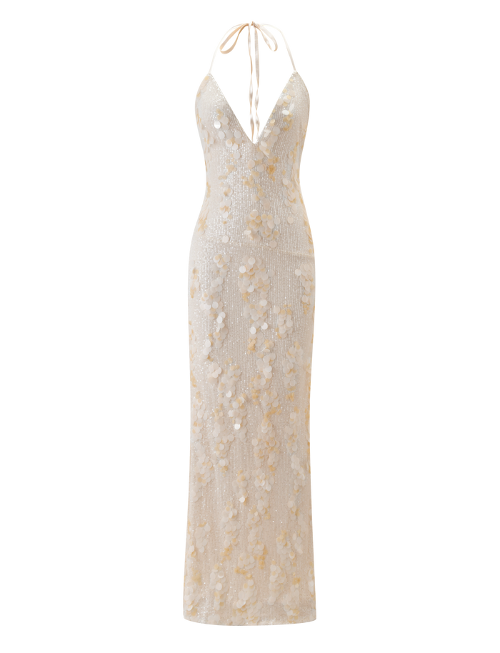 The ZANA MAXI DRESS - PEARL by TIGERMIST is a sleeveless sequin maxi with a plunging V-neckline, halter tie straps, and shimmering floral embellishments for an elegant statement look.
