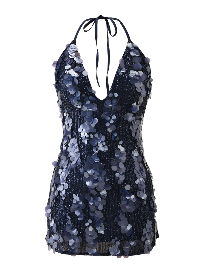 The ZANA MINI DRESS - NAVY SEQUIN by TIGERMIST is a sleeveless mini dress featuring large shimmering sequins, a plunging neckline, and a chic halter neck tie for an elegant look.