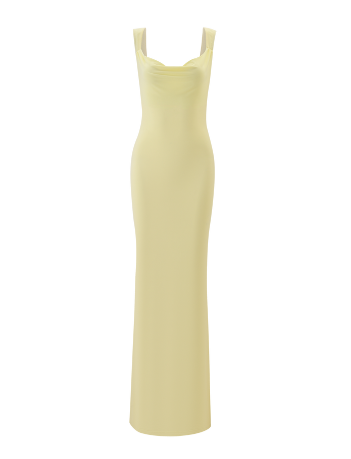 The TIGERMIST ZITA MAXI DRESS - LEMON is a long, sleeveless pastel yellow bodycon dress with a subtle draped neckline, shown against a matching plain yellow background.