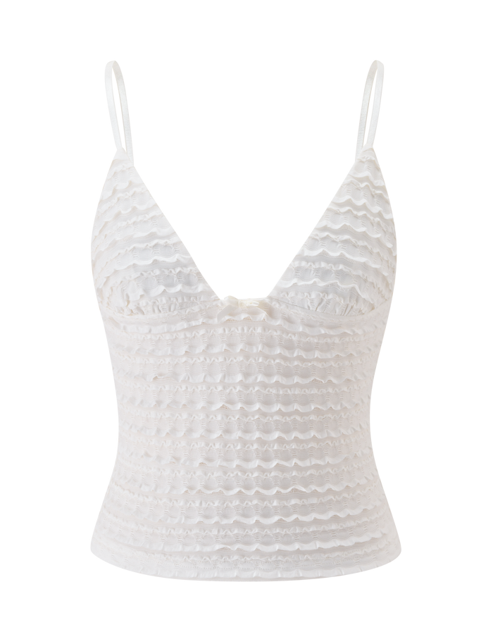 The TIGERMIST ZORA TOP - CREAM features a white lace design with a deep V-neckline, fitted silhouette, adjustable straps, and horizontal ruffle details. Displayed against a plain white background.